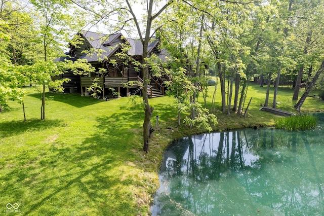 10823 E 200 N, Sheridan, IN 46069 - view of grassy yard with a deck with water view and stairs