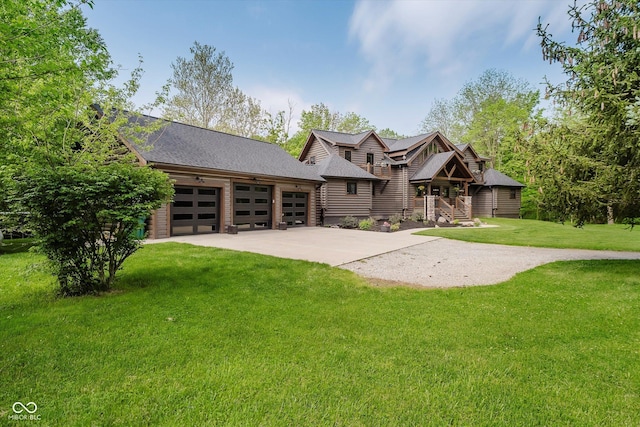 10823 E 200 N, Sheridan, IN 46069 - cabin featuring driveway, a garage, a front lawn, and roof with shingles