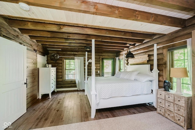 10823 E 200 N, Sheridan, IN 46069 - bedroom with log walls, wood-type flooring, and a wood ceiling with exposed beams