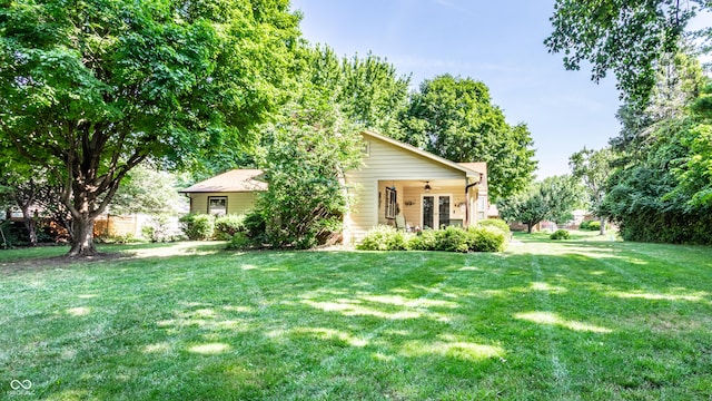 5123 Marble Ct, Indianapolis, IN 46237 - back of property with a ceiling fan and a lawn