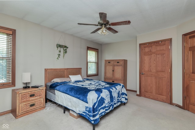 3696 Lakeshore Ct, Greenwood, IN 46143 - bedroom with light carpet and a ceiling fan
