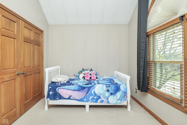 3696 Lakeshore Ct, Greenwood, IN 46143 - carpeted bedroom with lofted ceiling and baseboards
