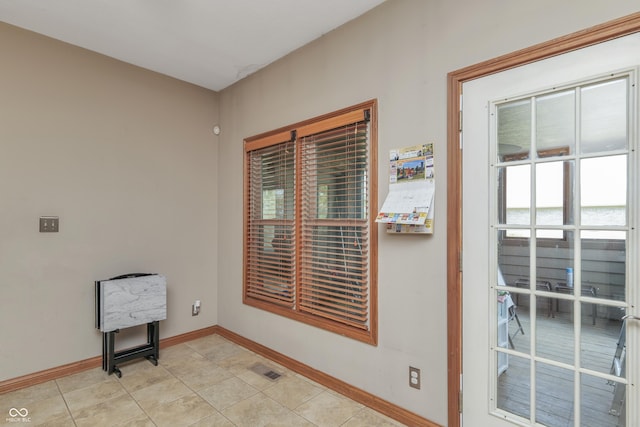 3696 Lakeshore Ct, Greenwood, IN 46143 - interior space featuring baseboards and light tile patterned floors