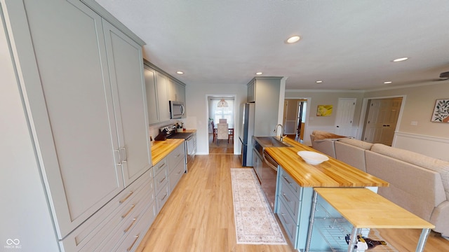 1623 Beech Cir, Plainfield, IN 46168 - kitchen with appliances with stainless steel finishes, wooden counters, gray cabinets, open floor plan, and light wood-style floors