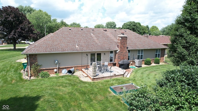 1623 Beech Cir, Plainfield, IN 46168 - rear view of property featuring brick siding, a chimney, and a yard