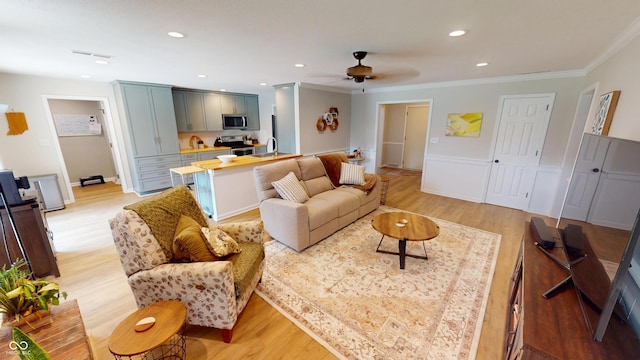 1623 Beech Cir, Plainfield, IN 46168 - living room with light wood-style flooring, crown molding, ceiling fan, wainscoting, and recessed lighting