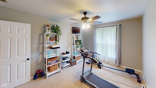 1623 Beech Cir, Plainfield, IN 46168 - exercise room featuring light colored carpet, a ceiling fan, and a textured ceiling