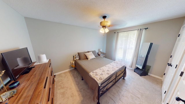1623 Beech Cir, Plainfield, IN 46168 - bedroom featuring light carpet, a textured ceiling, and a ceiling fan