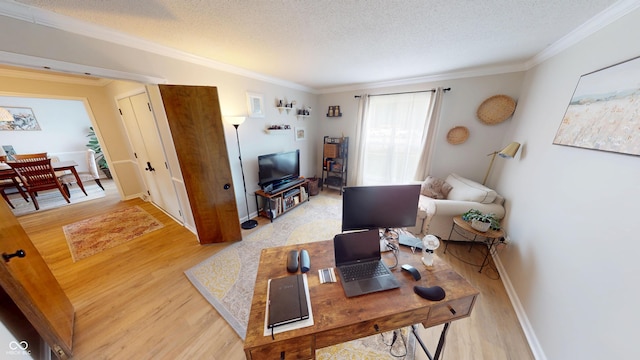 1623 Beech Cir, Plainfield, IN 46168 - living area featuring light wood-type flooring, crown molding, a textured ceiling, and a desk