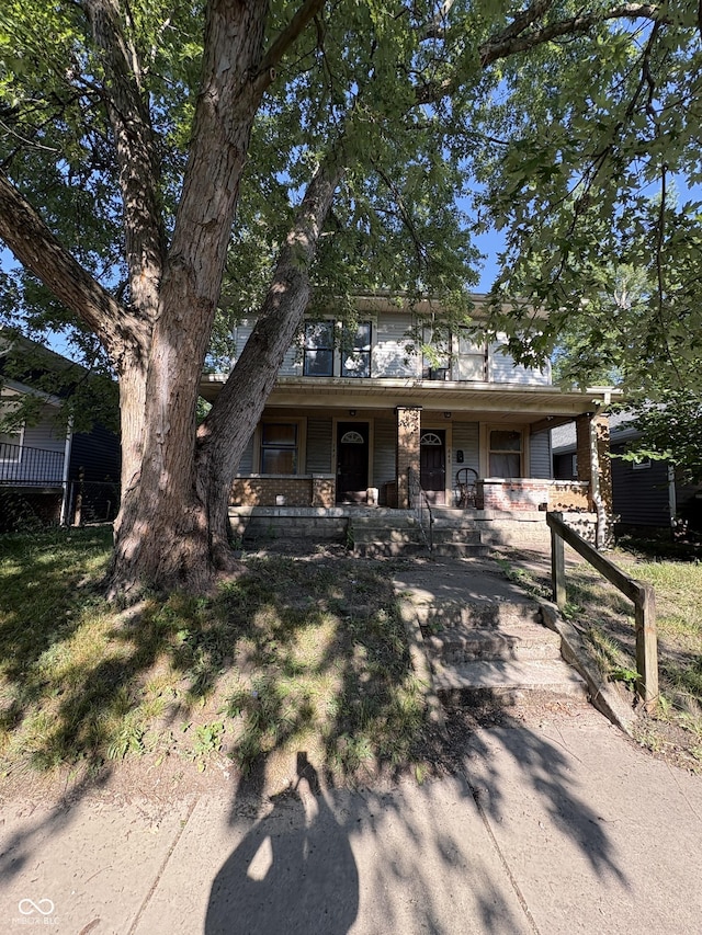 646 N Temple Ave, Indianapolis, IN 46201 - view of front facade with covered porch