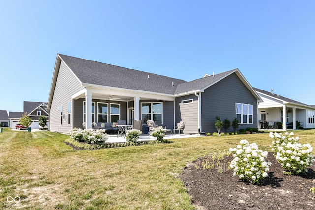 1360 Petit Verdot Dr, Westfield, IN 46074 - back of property with ceiling fan, a yard, a patio, and roof with shingles