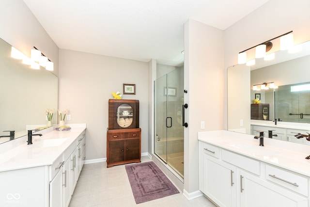1360 Petit Verdot Dr, Westfield, IN 46074 - full bath with two vanities, tile patterned flooring, and a stall shower