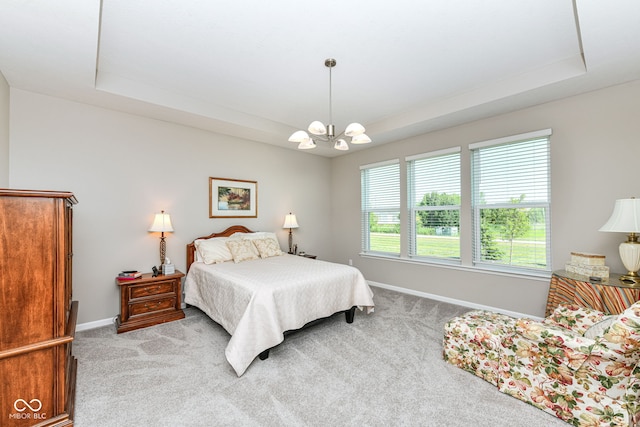 1360 Petit Verdot Dr, Westfield, IN 46074 - bedroom with a raised ceiling, light carpet, and a chandelier