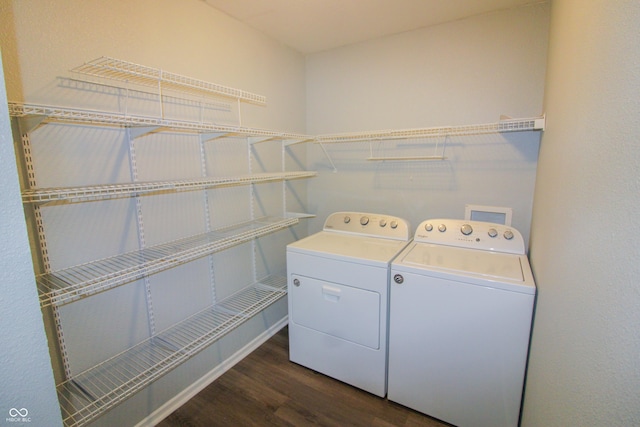 10610 Pavilion Dr, Indianapolis, IN 46259 - washroom featuring washing machine and dryer and dark wood-type flooring