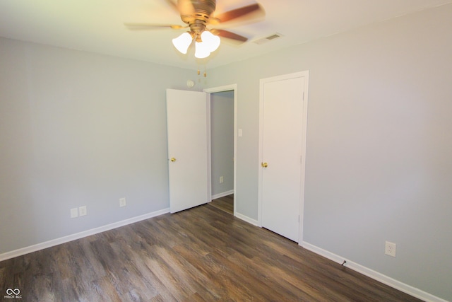 10610 Pavilion Dr, Indianapolis, IN 46259 - spare room featuring a ceiling fan and dark wood-style flooring