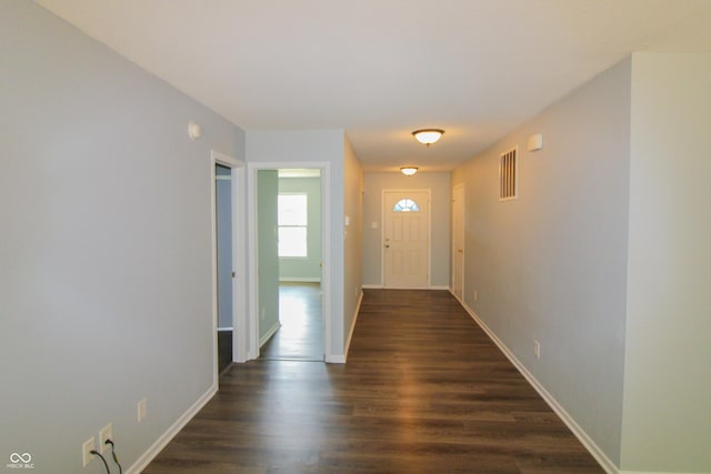 10610 Pavilion Dr, Indianapolis, IN 46259 - corridor with dark wood-type flooring and baseboards