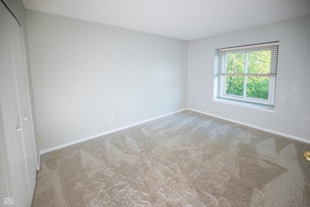 7151 Sea Pine Dr, Indianapolis, IN 46250 - carpeted empty room featuring baseboards