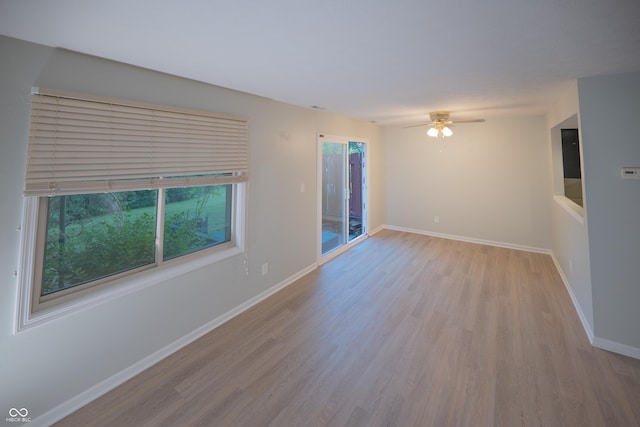 7151 Sea Pine Dr, Indianapolis, IN 46250 - unfurnished room featuring wood finished floors and a ceiling fan