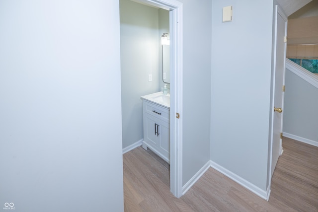 7151 Sea Pine Dr, Indianapolis, IN 46250 - bathroom with wood finished floors and vanity