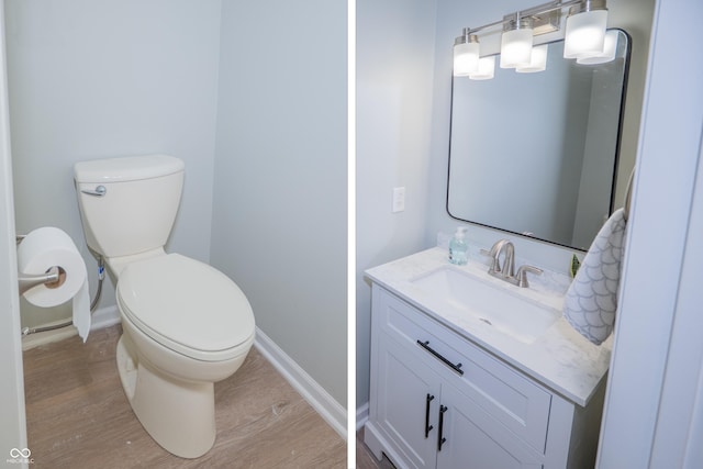 7151 Sea Pine Dr, Indianapolis, IN 46250 - bathroom featuring vanity and wood finished floors