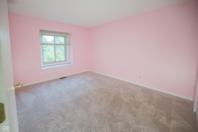 7151 Sea Pine Dr, Indianapolis, IN 46250 - carpeted spare room with baseboards