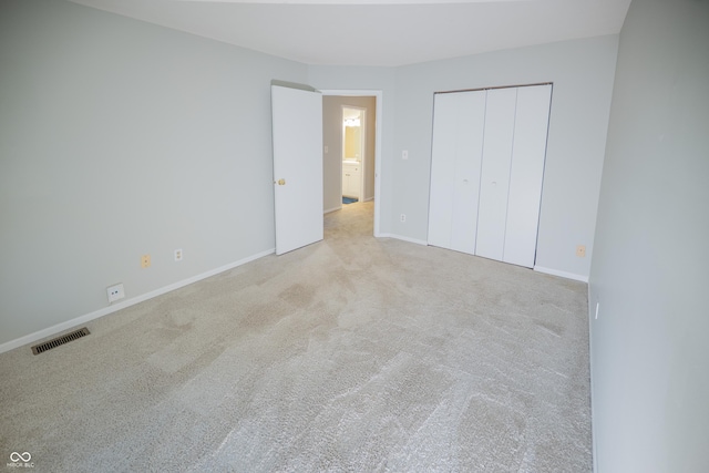 7151 Sea Pine Dr, Indianapolis, IN 46250 - unfurnished bedroom featuring carpet flooring and a closet