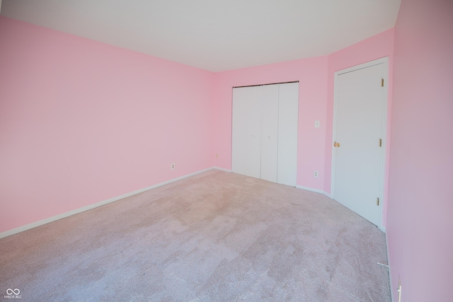 7151 Sea Pine Dr, Indianapolis, IN 46250 - unfurnished bedroom featuring carpet flooring and a closet