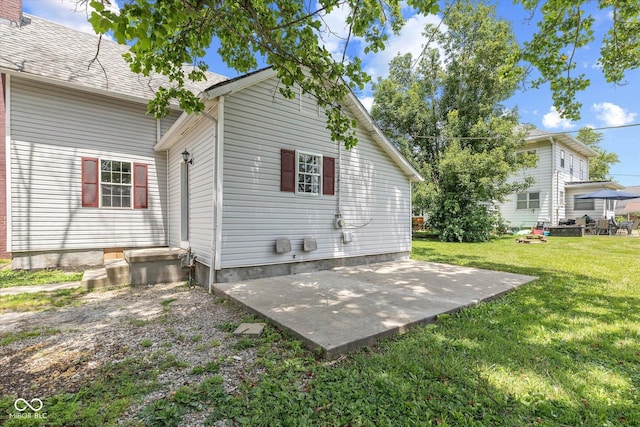149 E Jackson St, Cicero, IN 46034 - back of property featuring a patio and a yard
