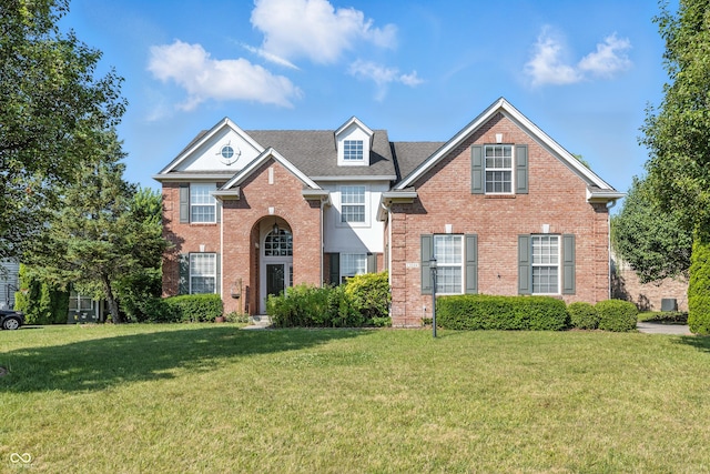 13004 Tuscany Blvd, Carmel, IN 46032 - traditional home with a front yard and brick siding