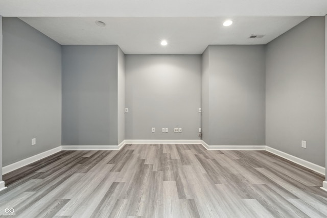 13004 Tuscany Blvd, Carmel, IN 46032 - empty room with wood finished floors and recessed lighting