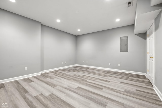 13004 Tuscany Blvd, Carmel, IN 46032 - unfurnished room with electric panel, light wood-style floors, and recessed lighting