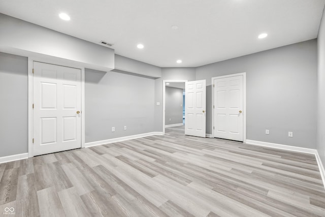 13004 Tuscany Blvd, Carmel, IN 46032 - unfurnished bedroom with light wood finished floors and recessed lighting