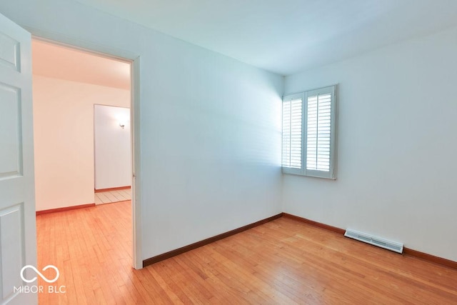 7525 Surrey Dr, Indianapolis, IN 46227 - empty room featuring light wood-style floors and baseboards