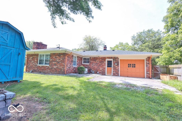 7525 Surrey Dr, Indianapolis, IN 46227 - rear view of property with a chimney, a garage, and brick siding