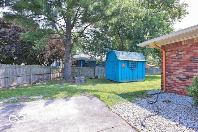 7525 Surrey Dr, Indianapolis, IN 46227 - fenced backyard featuring a storage shed and a patio area