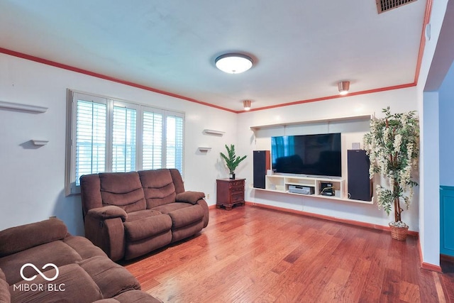 7525 Surrey Dr, Indianapolis, IN 46227 - living room featuring wood finished floors and ornamental molding