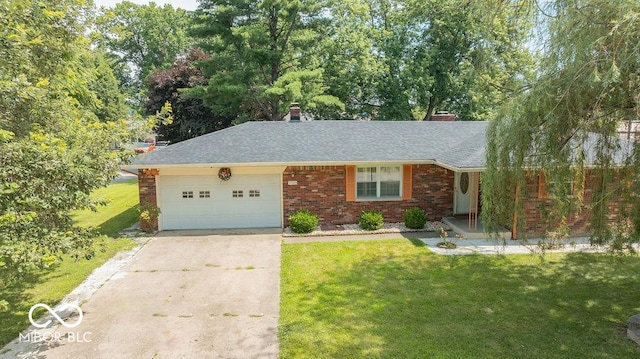 7525 Surrey Dr, Indianapolis, IN 46227 - ranch-style home with concrete driveway, an attached garage, a front lawn, and brick siding
