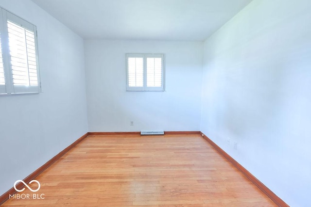 7525 Surrey Dr, Indianapolis, IN 46227 - spare room featuring light wood-style floors and baseboards