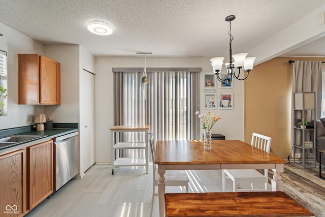 2564 Woodfield Blvd, Franklin, IN 46131 - dining room with a textured ceiling, a chandelier, and light wood finished floors