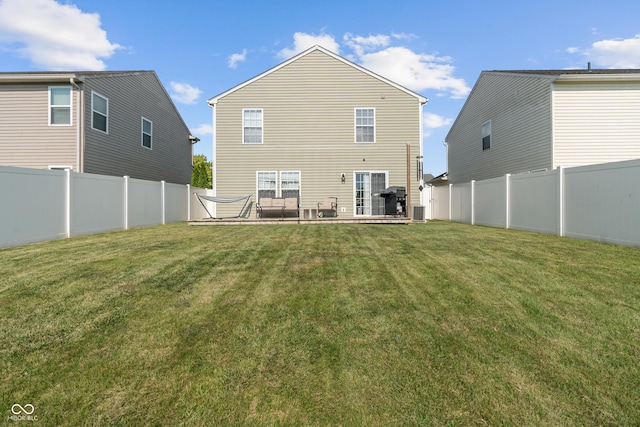 2564 Woodfield Blvd, Franklin, IN 46131 - back of house featuring a fenced backyard and a patio