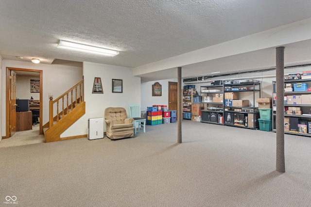 12011 Emory Dr, Indianapolis, IN 46229 - finished basement featuring carpet floors, stairs, and a textured ceiling