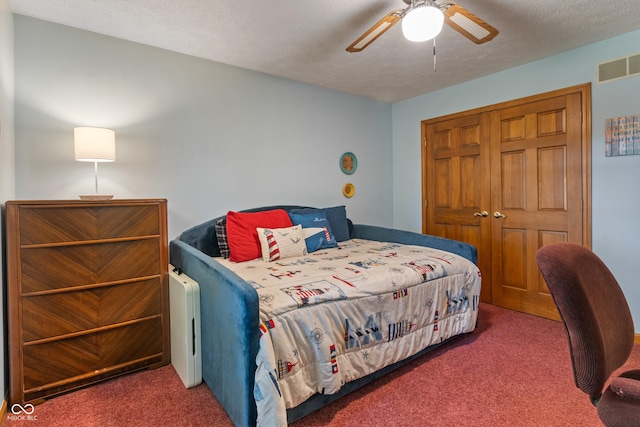 12011 Emory Dr, Indianapolis, IN 46229 - carpeted bedroom with a closet and ceiling fan