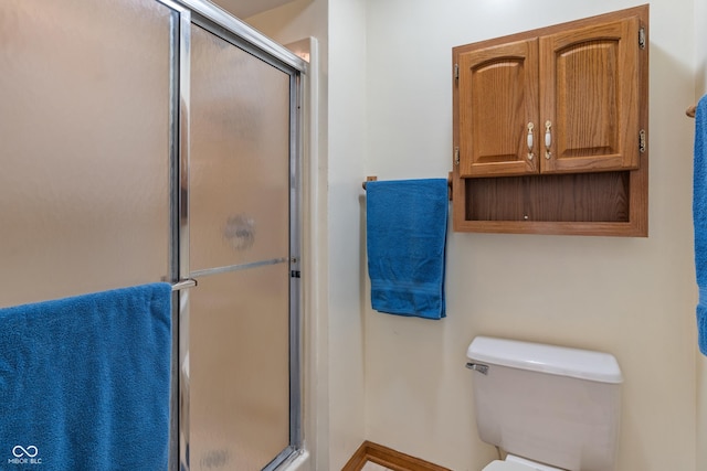 12011 Emory Dr, Indianapolis, IN 46229 - full bathroom featuring a stall shower and toilet
