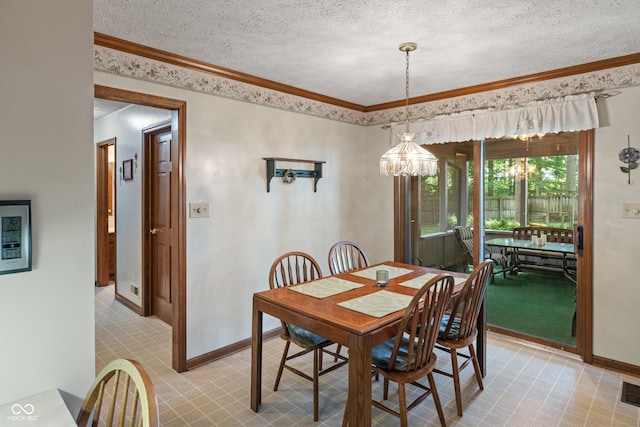 12011 Emory Dr, Indianapolis, IN 46229 - dining space with a chandelier, a textured ceiling, and ornamental molding