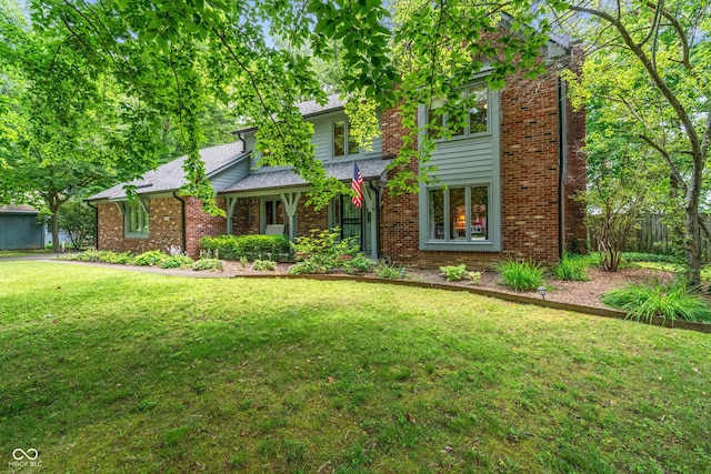 12011 Emory Dr, Indianapolis, IN 46229 - traditional-style house with brick siding and a front yard
