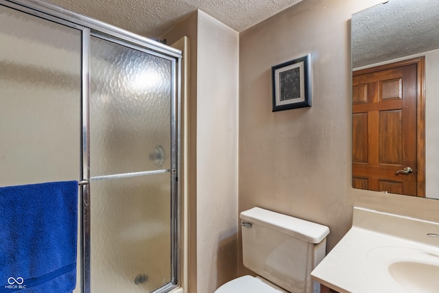 12011 Emory Dr, Indianapolis, IN 46229 - full bath with a textured ceiling, vanity, and a shower stall