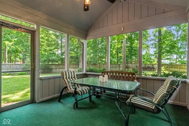 12011 Emory Dr, Indianapolis, IN 46229 - sunroom / solarium featuring vaulted ceiling, a ceiling fan, carpet, and outdoor dining area