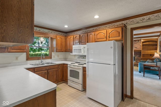12011 Emory Dr, Indianapolis, IN 46229 - kitchen with white appliances, brown cabinets, light countertops, ornamental molding, and a textured ceiling
