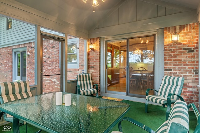 12011 Emory Dr, Indianapolis, IN 46229 - sunroom with outdoor dining area and lofted ceiling