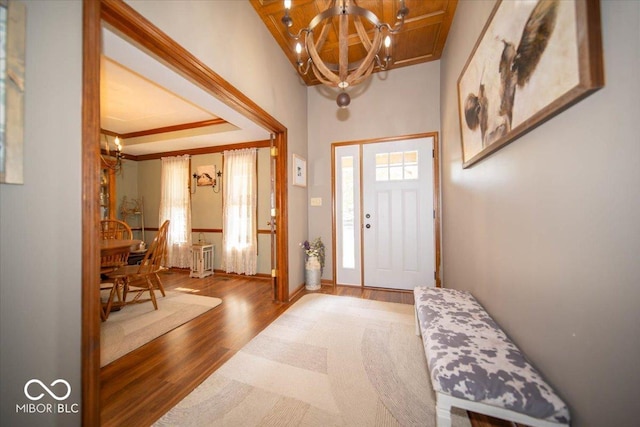 2259 Willow Lake Dr, Greenwood, IN 46143 - foyer with a chandelier and wood finished floors